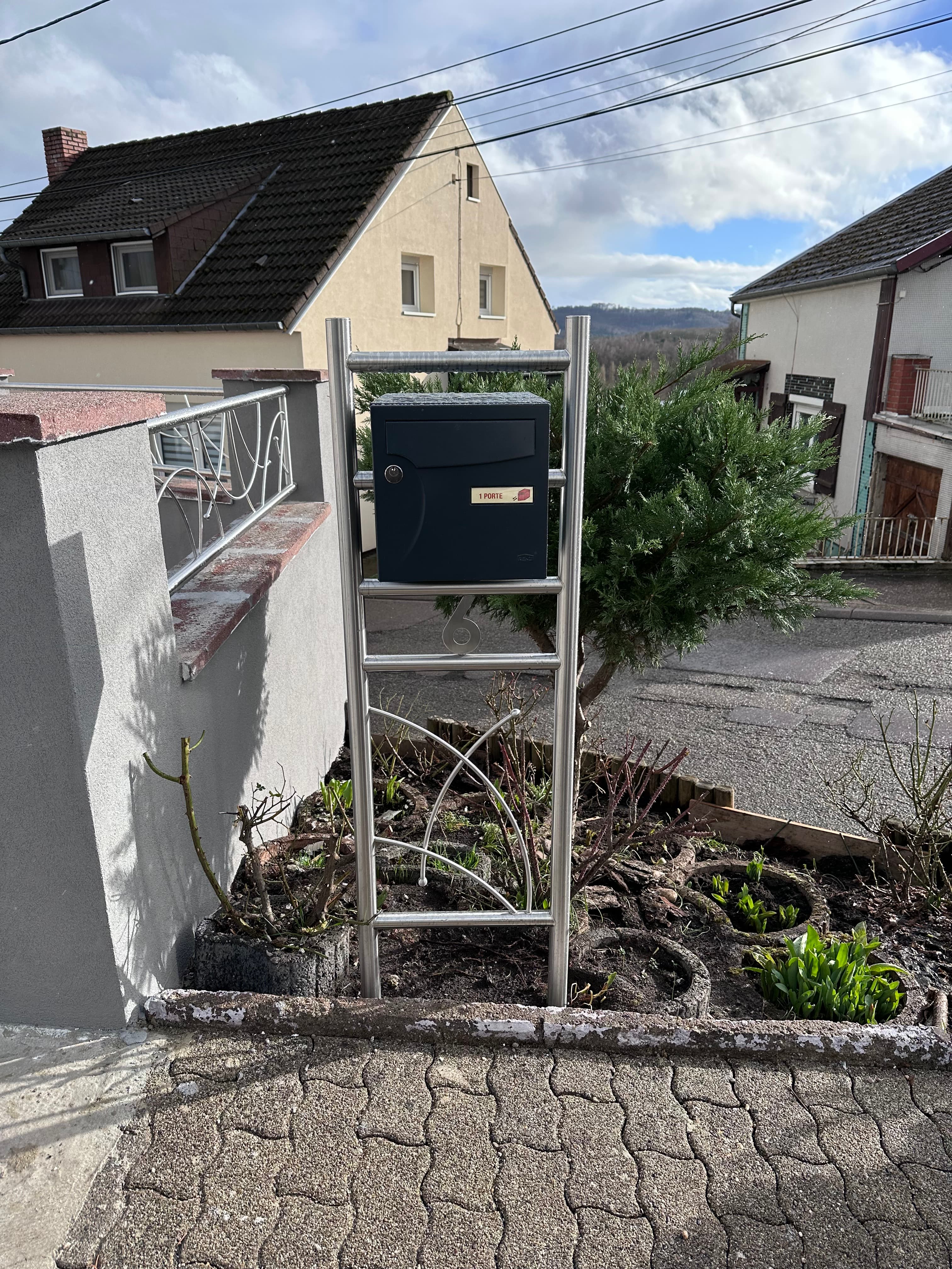 Support de boîte aux lettres en inox